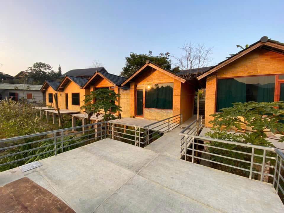 The terrace of a wooden homestay bungalow